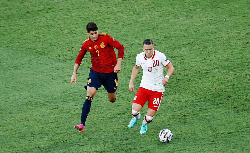 Piotr Zielinski ed Alvaro Morata